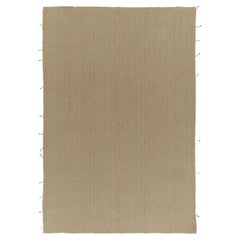 Rug & Kilim è un kilim contemporaneo in stile Sandy, pannello solido beige-marrone.