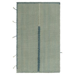 Rug & Kilim’s Contemporary Kilim in Seafoam with Blue Accents