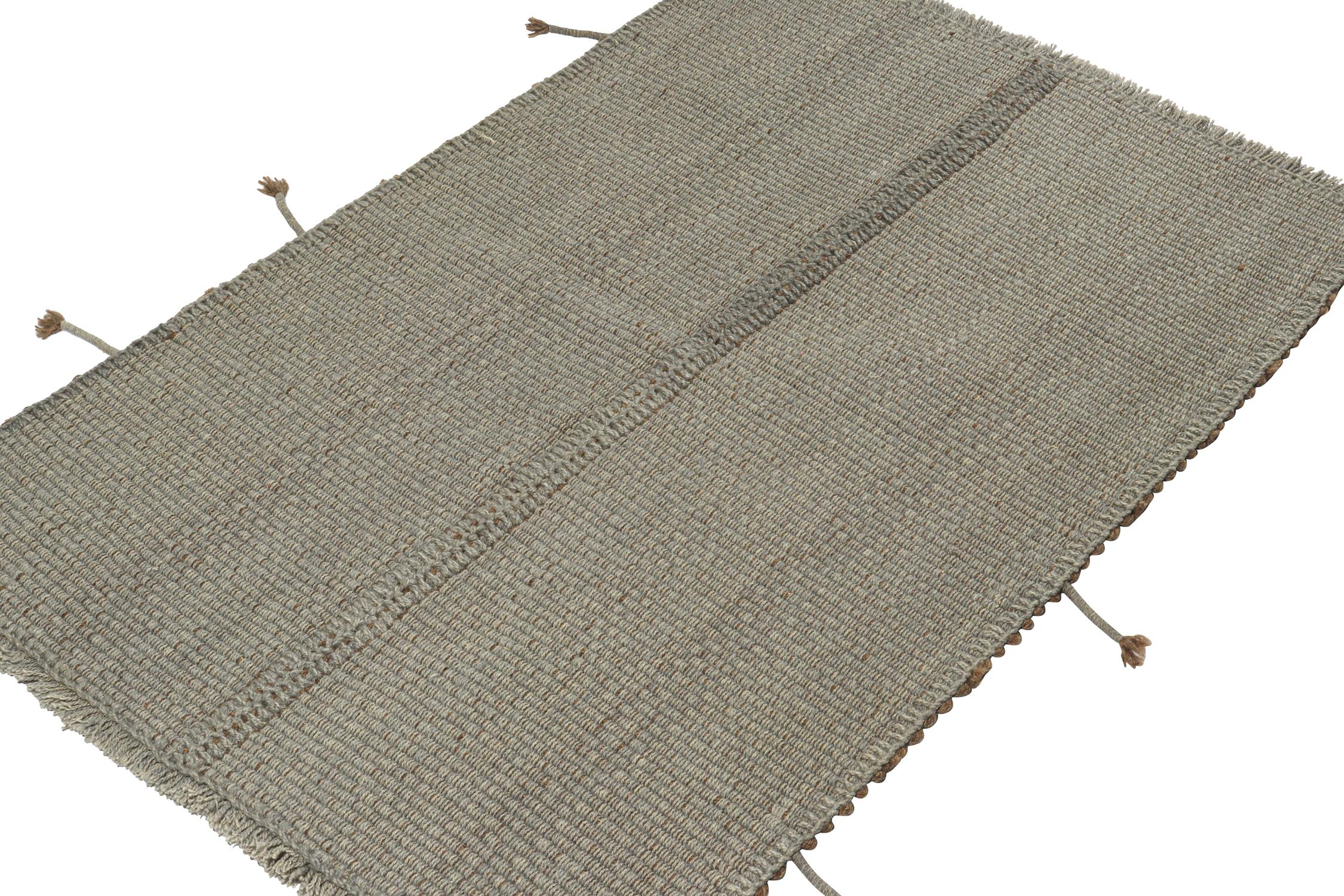 Handwoven in wool, a 3x4 Kilim from a bold, artisan line of contemporary flatweaves by Rug & Kilim.


On the Design:

This “Rez Kilim” piece enjoys a more durable take on classic panel-woven style in handsome gray hues with brown accents. Subtle