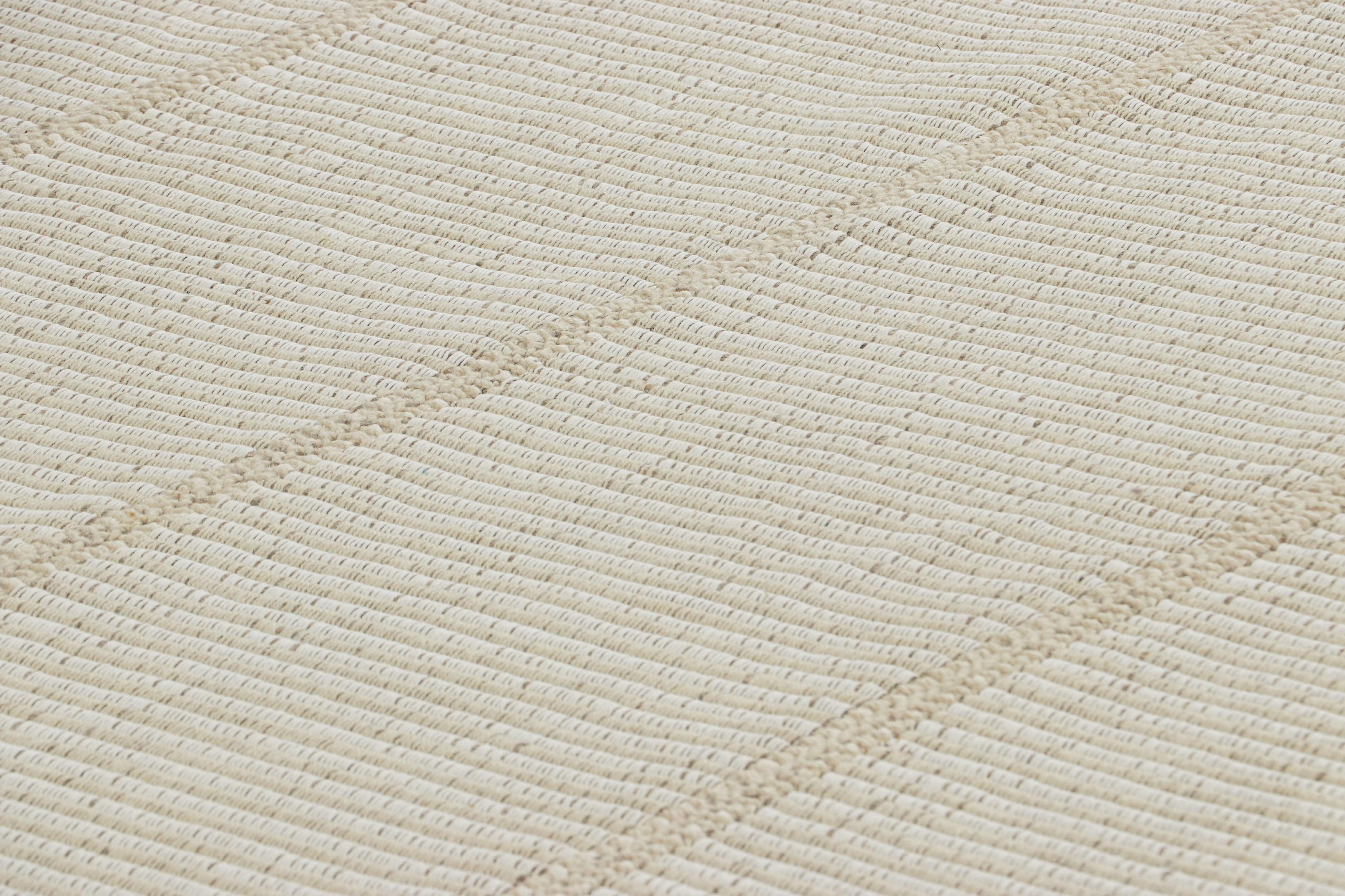 Tissé à la main en laine, ce Kilim contemporain 10x14 fait partie d'une nouvelle collection de tissage plat personnalisable de Rug & Kilim.

Sur le Design :

