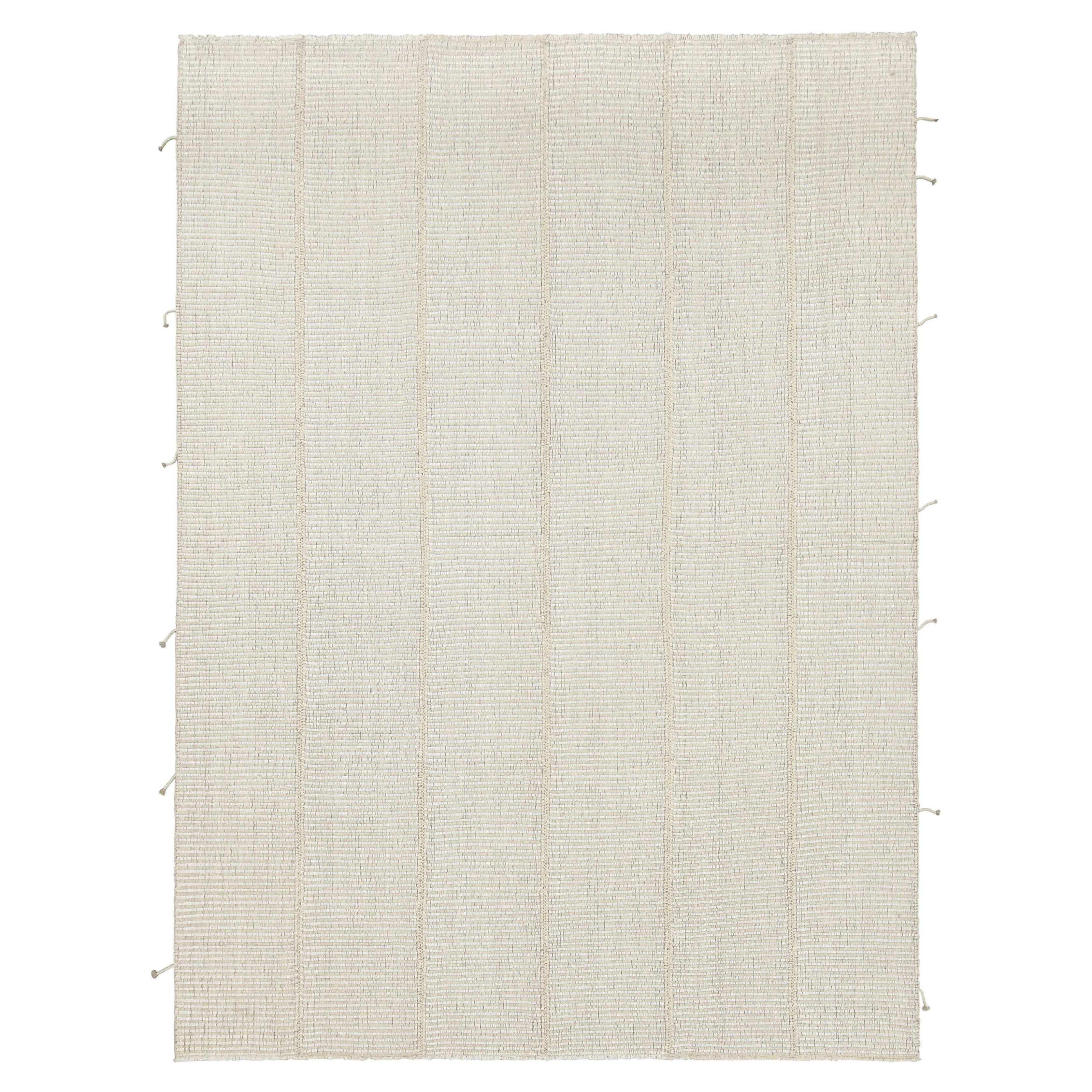 Rug
Kilim è un kilim contemporaneo a strisce beige-marrone e bianco crema.