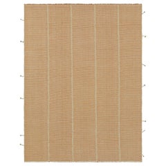 Rug 
Kilim è un kilim contemporaneo a strisce arancioni e bianche.