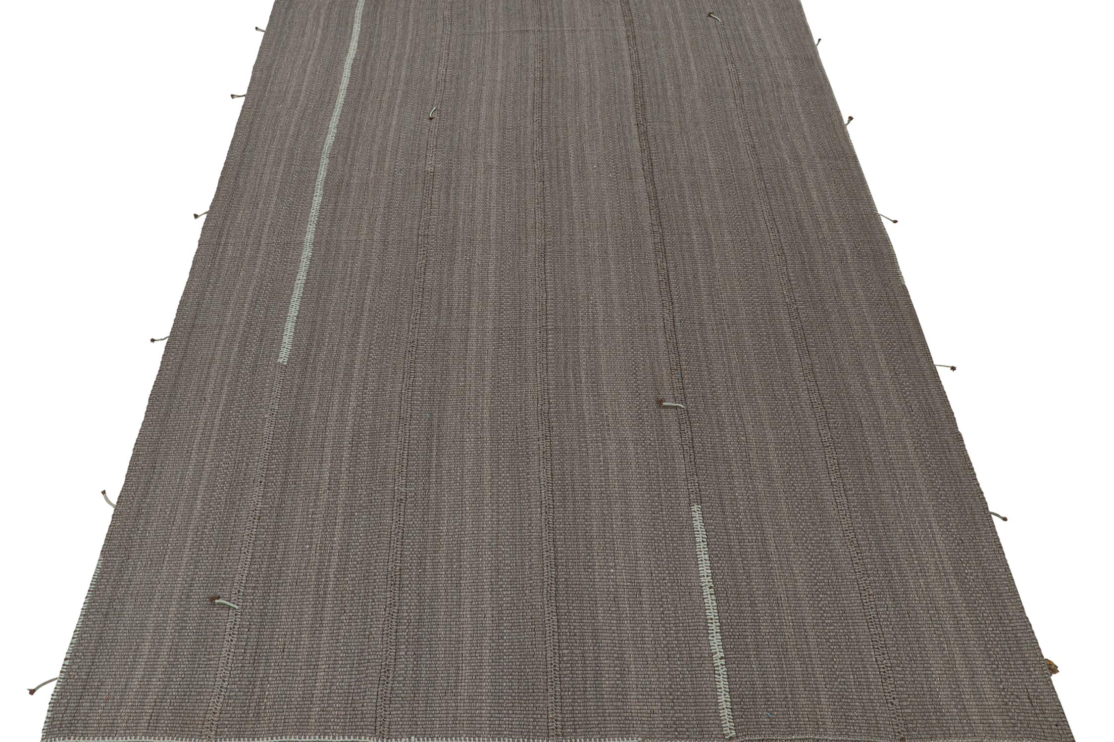 Handwoven in wool, this 10x14 Kilim is from a bold new line of contemporary flatweaves by Rug & Kilim.

Further On the Design:

The “Rez Kilim” connotes a modern take on classic panel weaving. This edition enjoys stripes in cool sky blue and slate