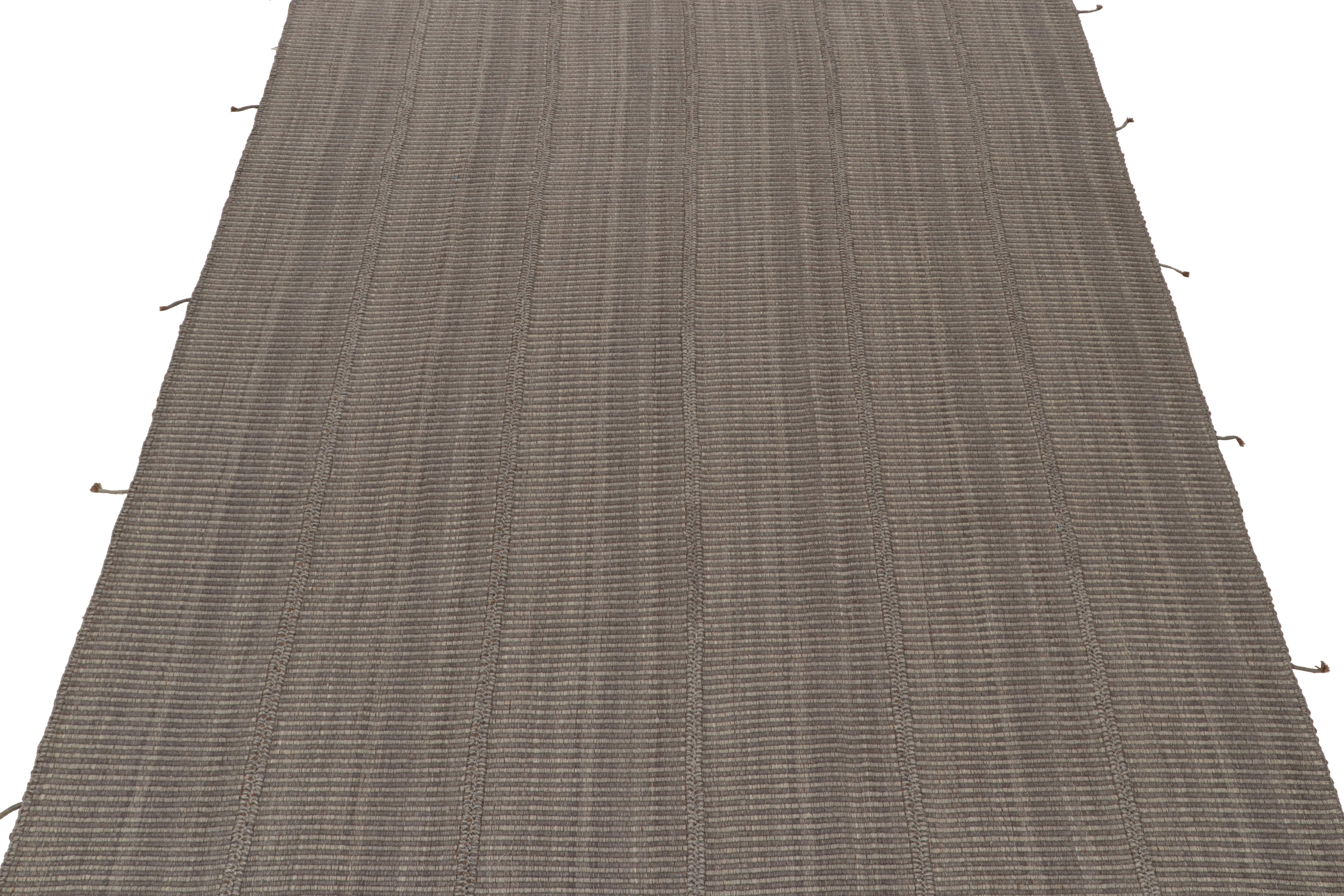 Handwoven in wool, this 9x12 Kilim is from an exciting new line of contemporary flatweaves by Rug & Kilim.

Further On the Design:

The “Rez Kilim” connotes a modern take on classic panel weaving. This particular rug enjoys stripes and striae in