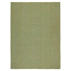 Tapis Kilim contemporain de Rug & Kilim en vert avec des accents sarcelle et rose