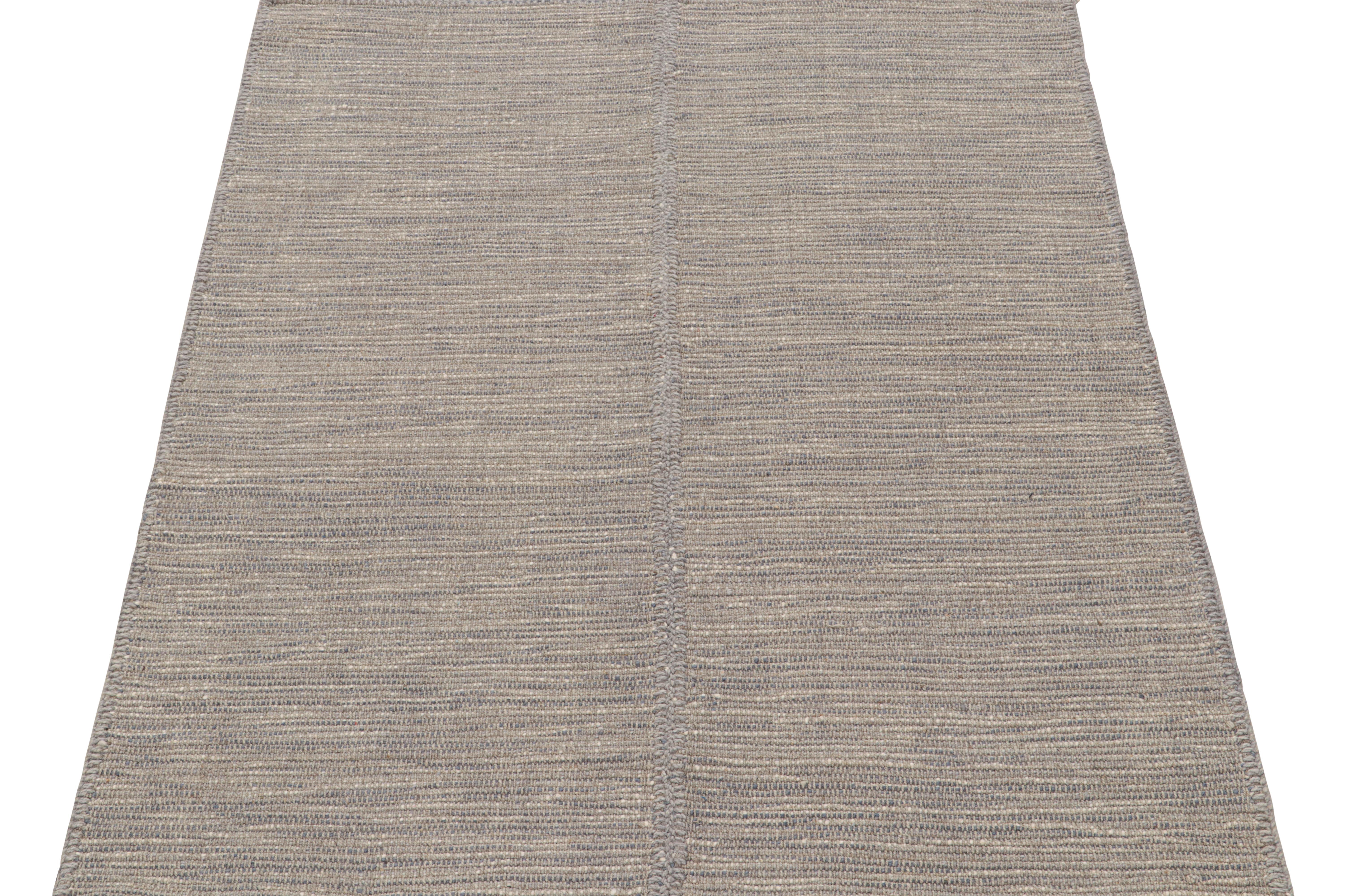 Handwoven in wool, this 4x5 Kilim is from a bold new line of contemporary flatweaves by Rug & Kilim.

Further On the Design:

The “Rez Kilim” connotes a modern take on classic panel weaving. This edition enjoys light gray with beige and blue