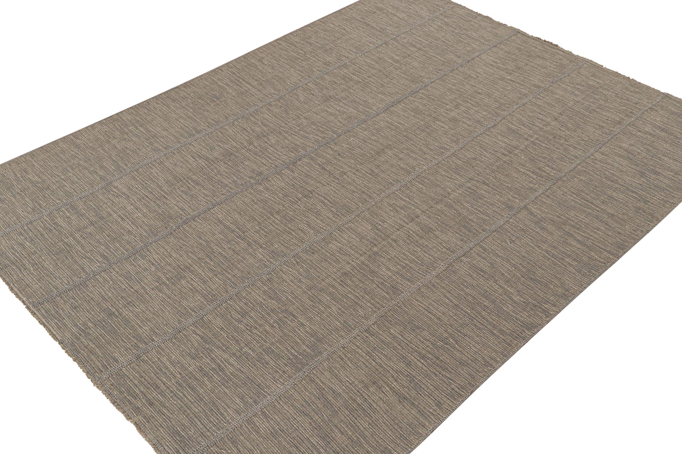 Handwoven in wool, this 9x12 Kilim is from a bold new line of contemporary flatweaves by Rug & Kilim.

Further On the Design:

The “Rez Kilim” connotes a modern take on classic panel weaving. This edition enjoys light gray with beige and blue