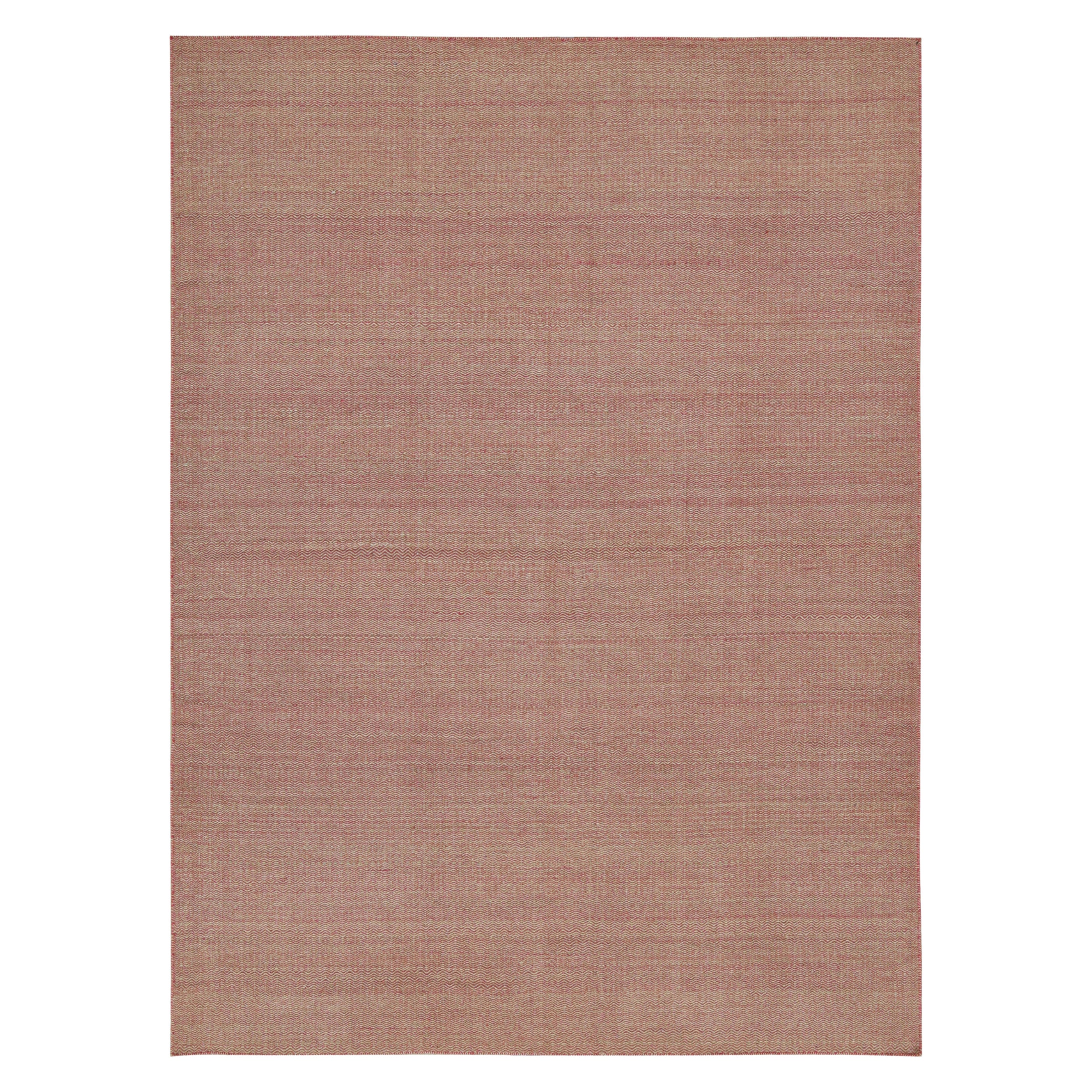 Handwoven in wool, this 8x11 Kilim is from a new line of contemporary flatweaves by Rug & Kilim.

Its construction uses a paddle-weave technique that plays complementary colors together in a fine series of chevron patterns. This edition enjoys a