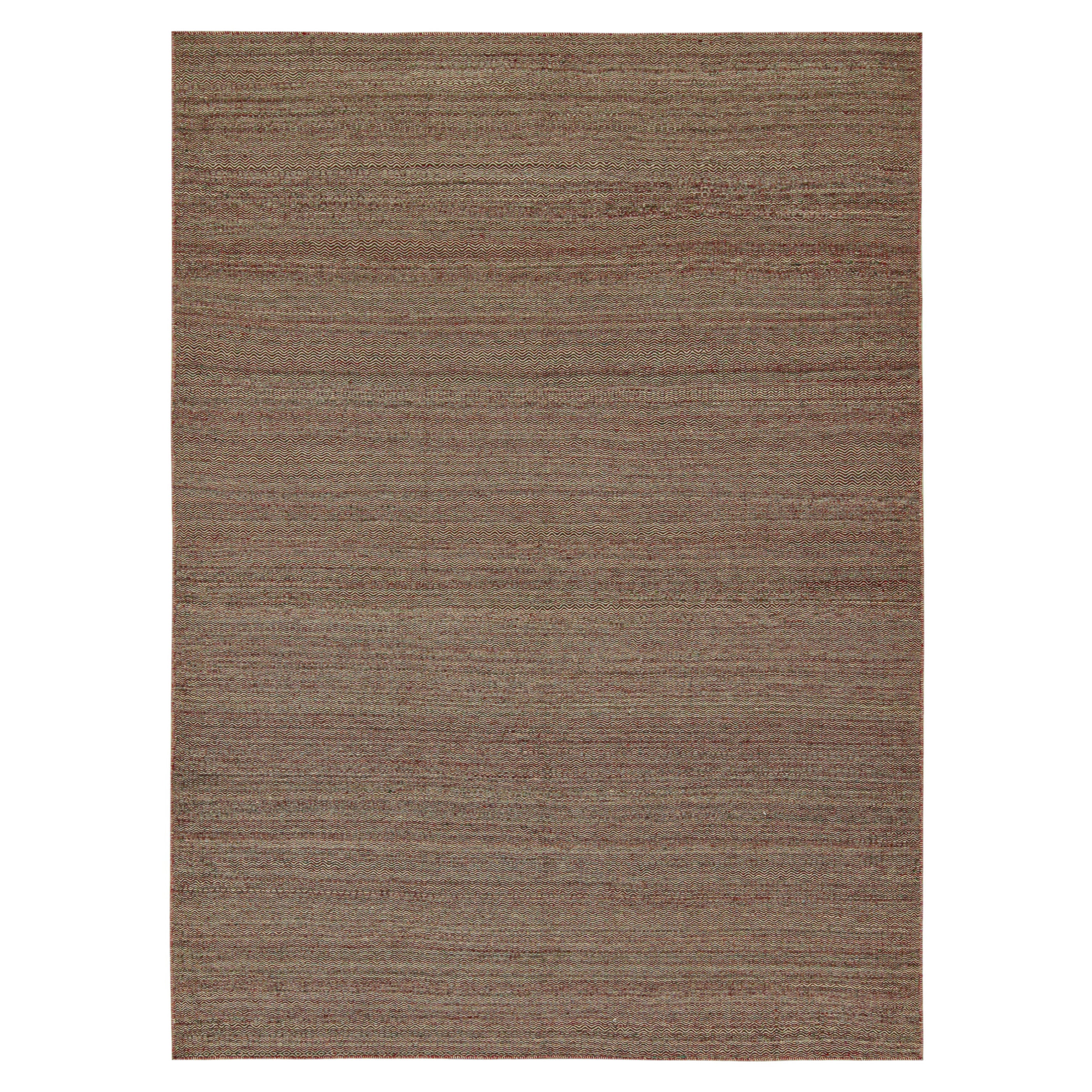 Tessuto a mano in lana, questo Kilim 8x11 fa parte di una nuova linea di tessuti piatti contemporanei di Rug & Kilim.

La sua costruzione utilizza una tecnica di intreccio a palette che fa interagire i colori complementari in una raffinata serie