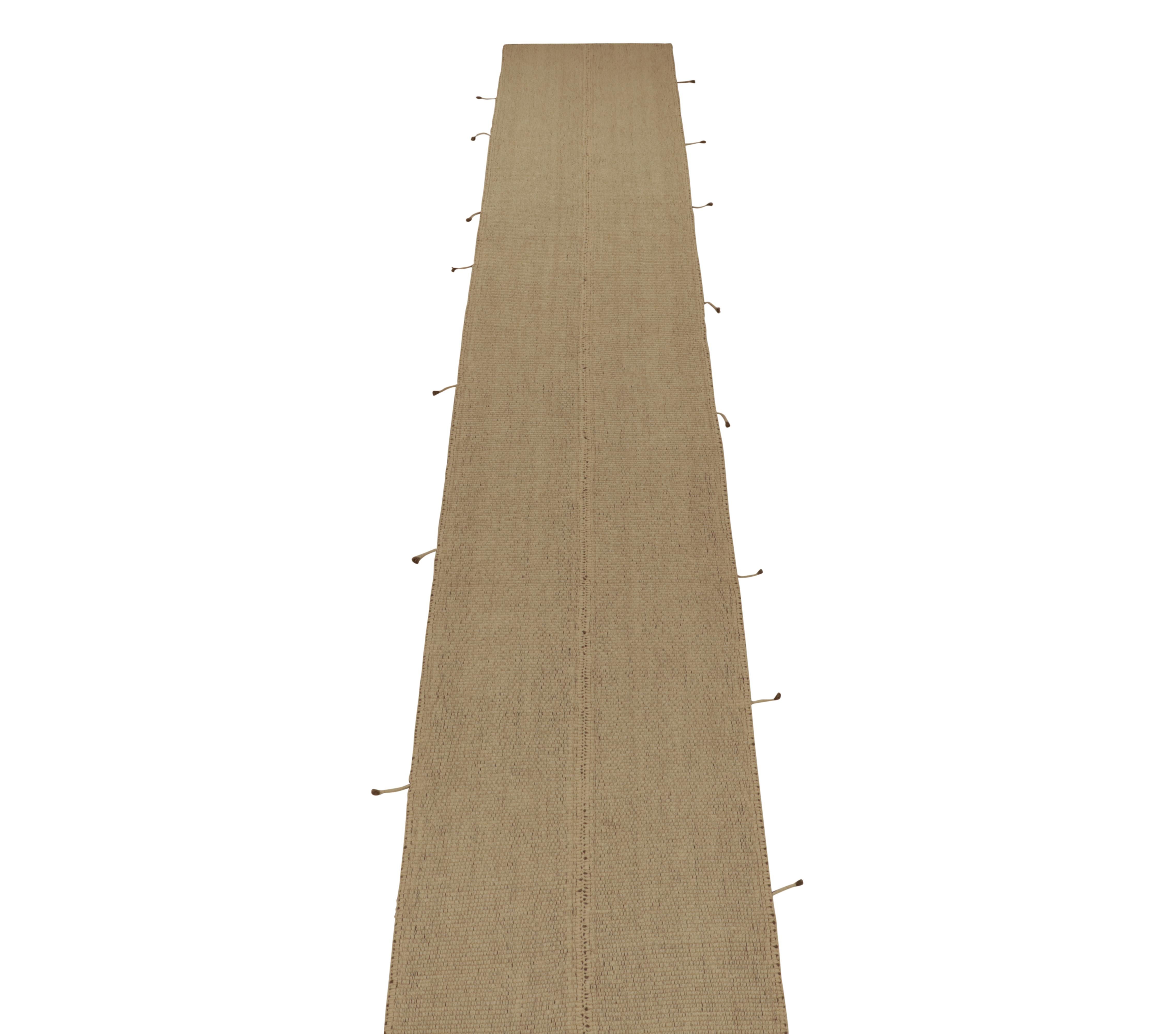 Handwoven in wool, an oversized 3x27 Kilim runner from an innovative new contemporary flat weave collection by Rug & Kilim.

On the Design:

“Rez Kilim” connotes a modern take on classic panel weaving—this edition enjoying neutral beige-brown hues