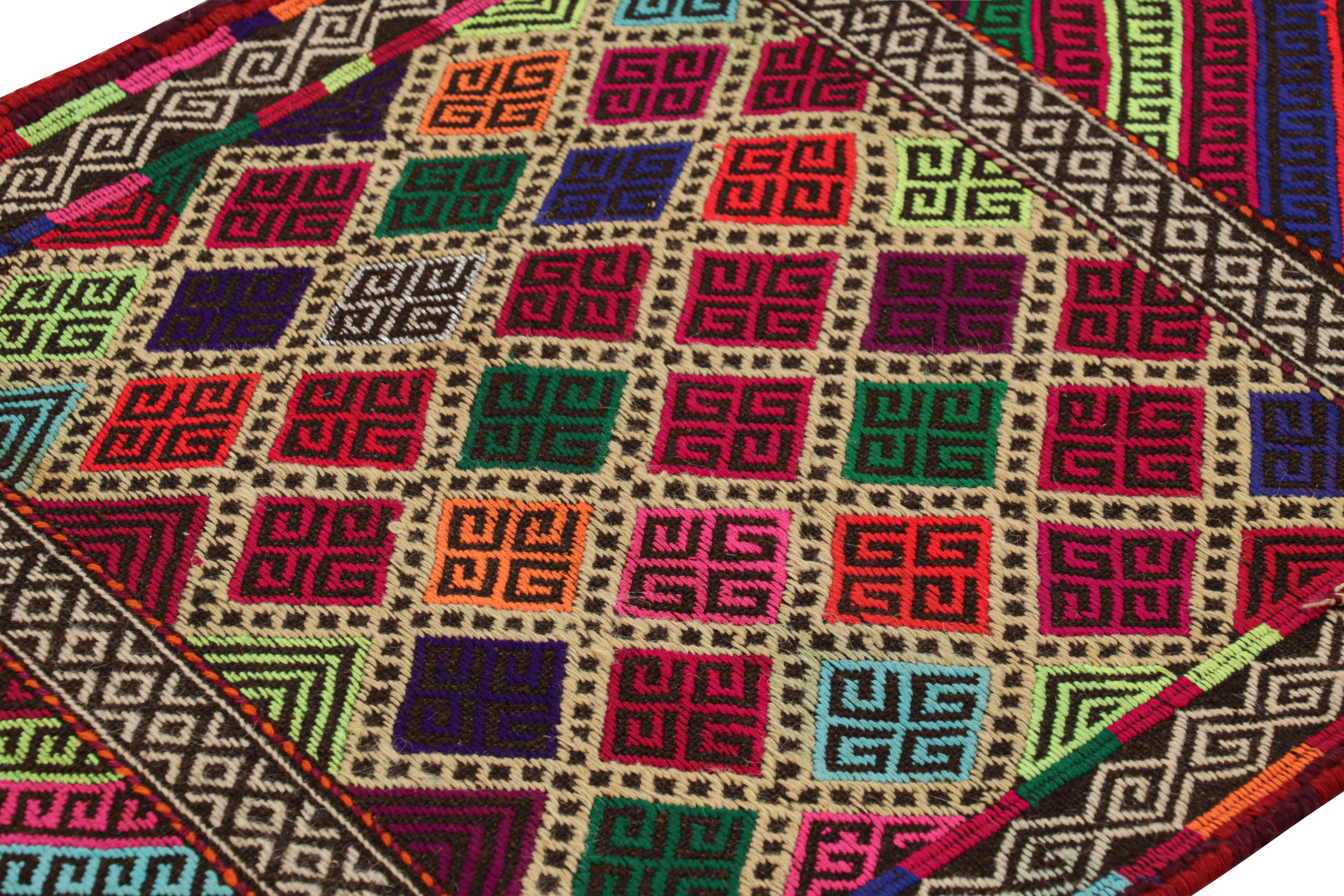 Handwoven in wool, this 2x8 modern geometric kilim runner rug represents a new line of tribal carpets in the Modern Classics Collection by Rug & Kilim. Each piece represents the work of women weavers in Afghanistan, preserving the rich tradition of
