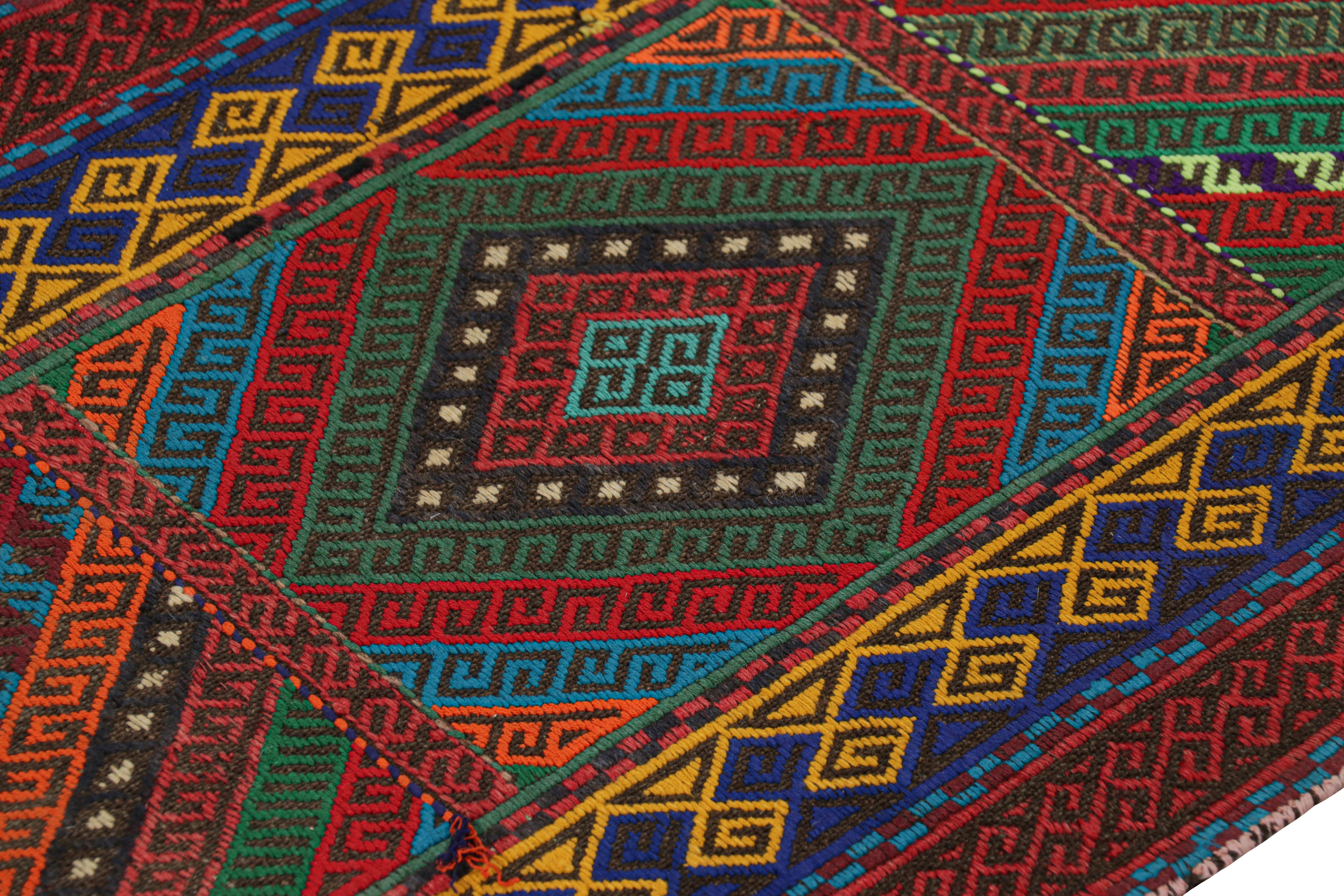 Handwoven in wool, this 2x7 modern geometric kilim runner rug represents a new line of tribal carpets in the Modern Classics Collection by Rug & Kilim. Each piece represents the work of women weavers in Afghanistan, preserving the rich tradition of