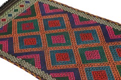 Rug & Kilim’s Contemporary Kilim Runner with Polychromatic Geometric Medallions