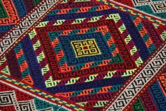 Rug & Kilim’s Contemporary Kilim Runner with Polychromatic Geometric Medallions