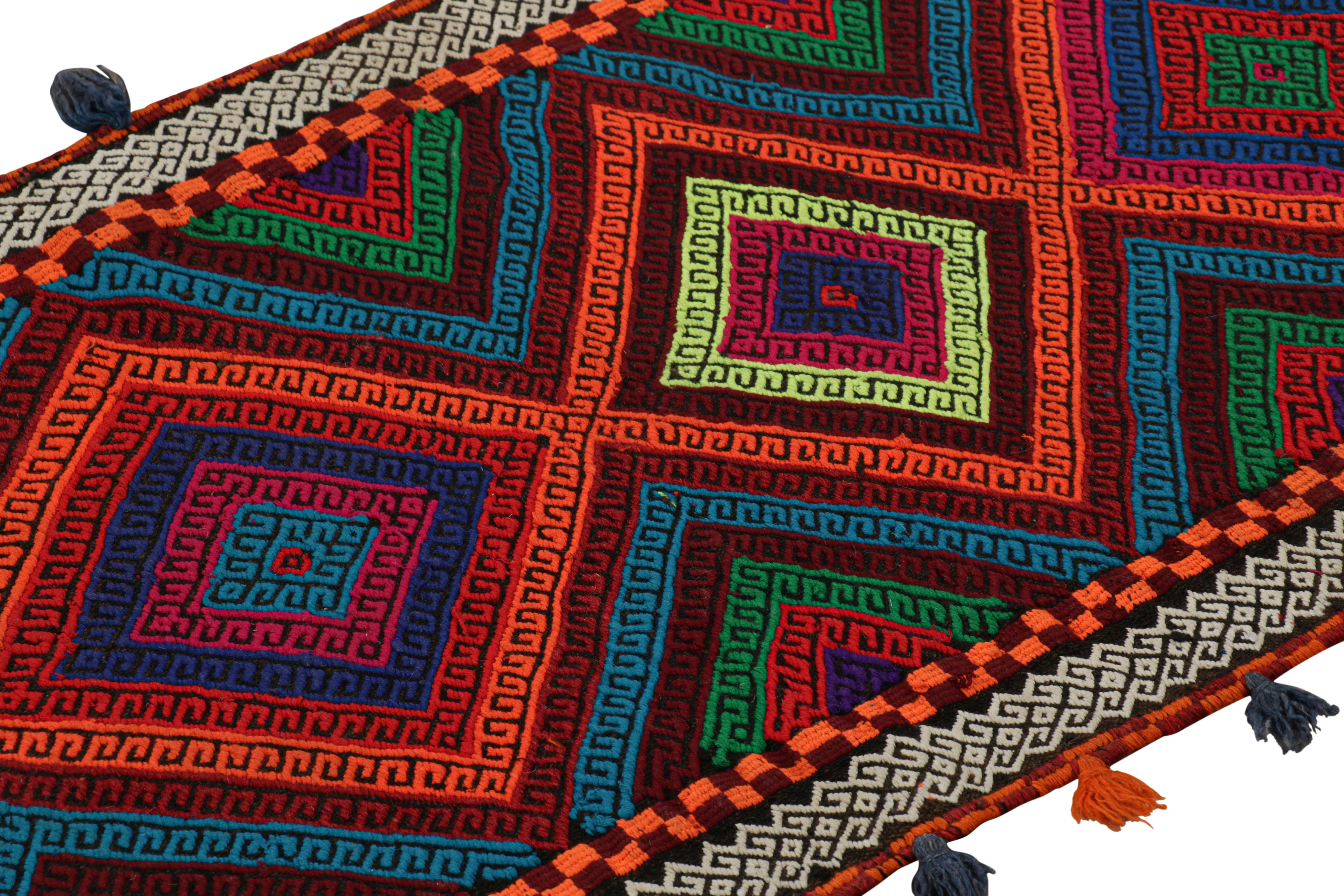 Handwoven in wool, this 2x6 modern geometric kilim runner rug represents a new line of tribal carpets in the Modern Classics Collection by Rug & Kilim. Each piece represents the work of women weavers in Afghanistan, preserving the rich tradition of