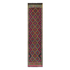 Rug & Kilim’s Contemporary Kilim Runner with Polychromatic Geometric Medallions