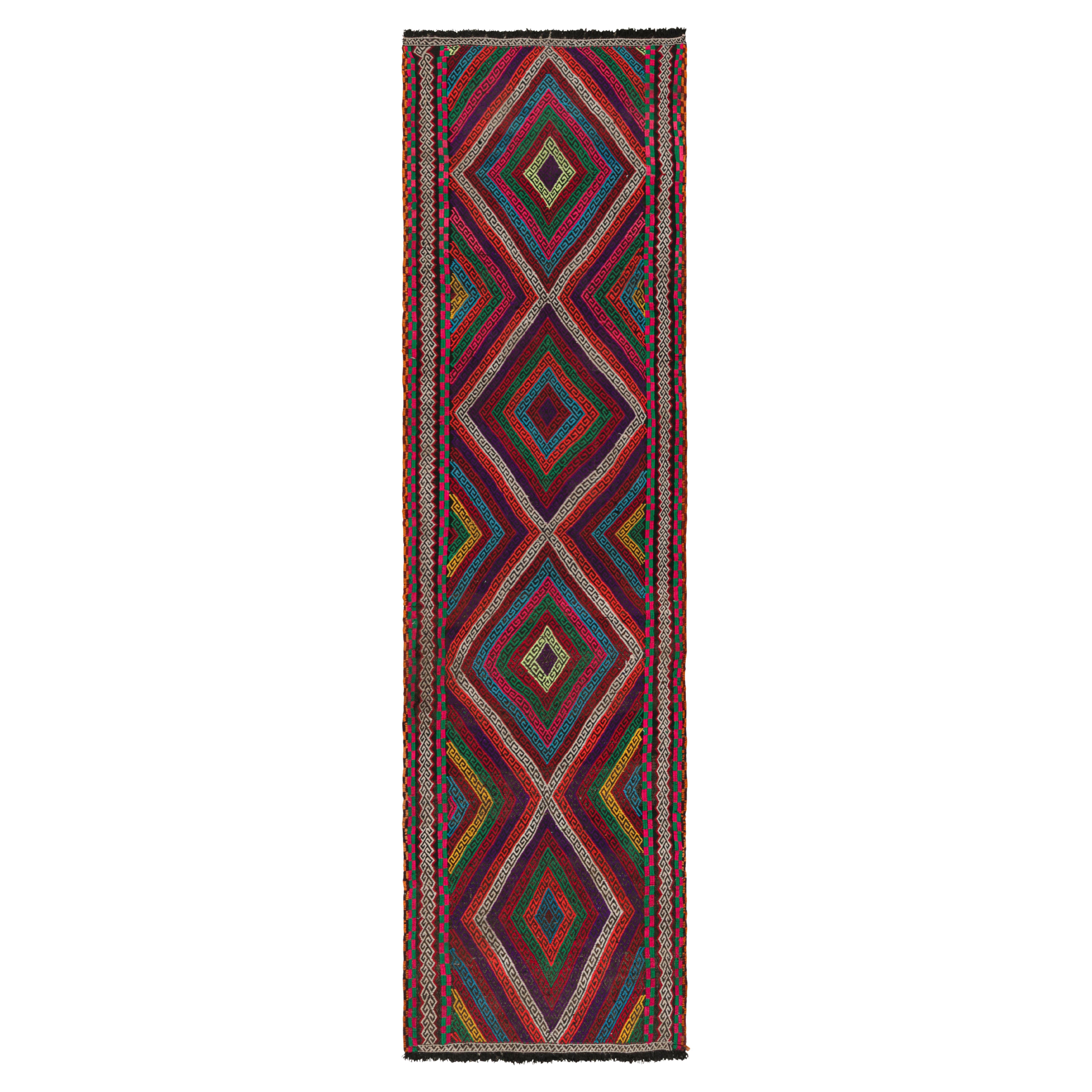 Rug & Kilim’s Contemporary Kilim Runner with Polychromatic Geometric Medallions