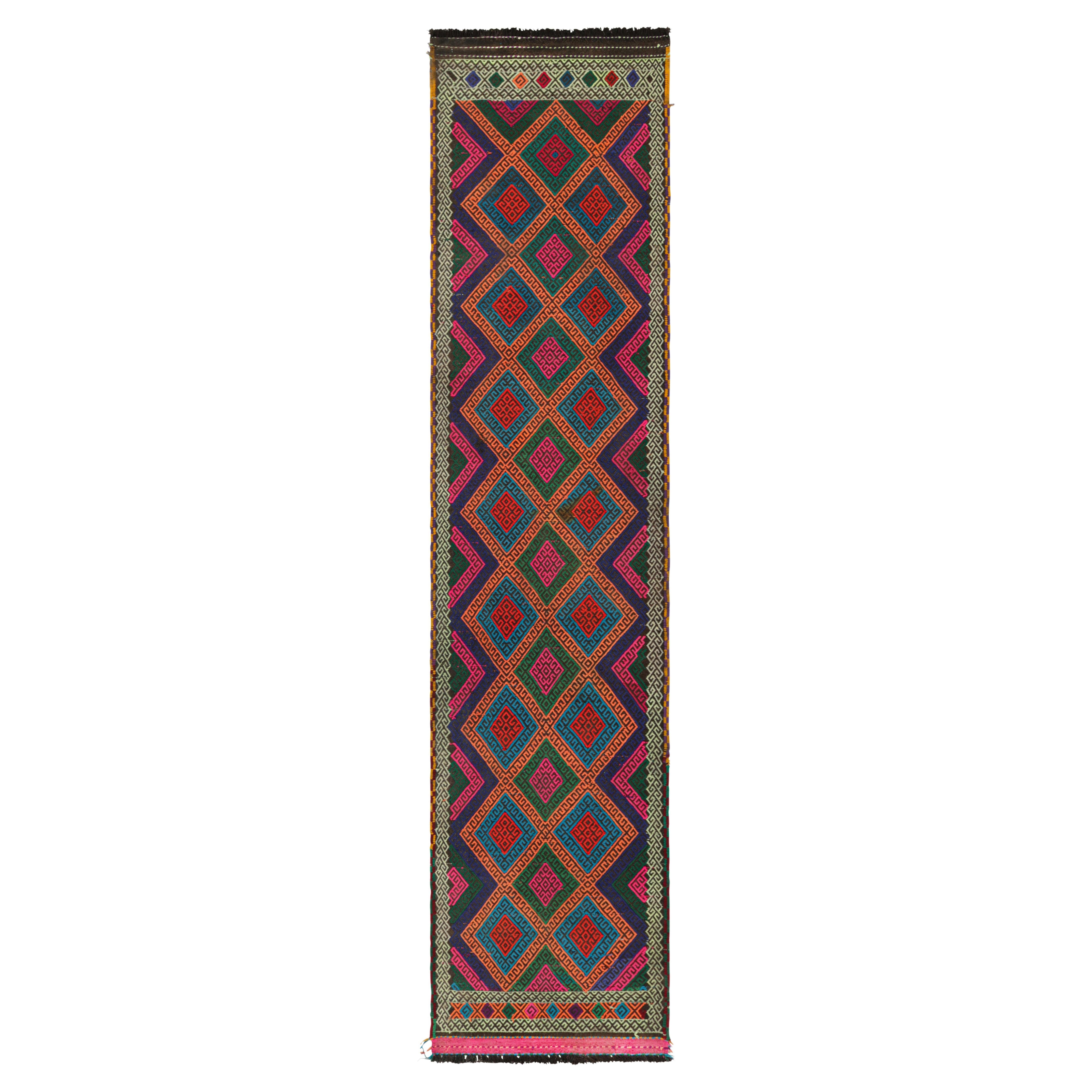 Rug & Kilim’s Contemporary Kilim Runner with Polychromatic Geometric Medallions