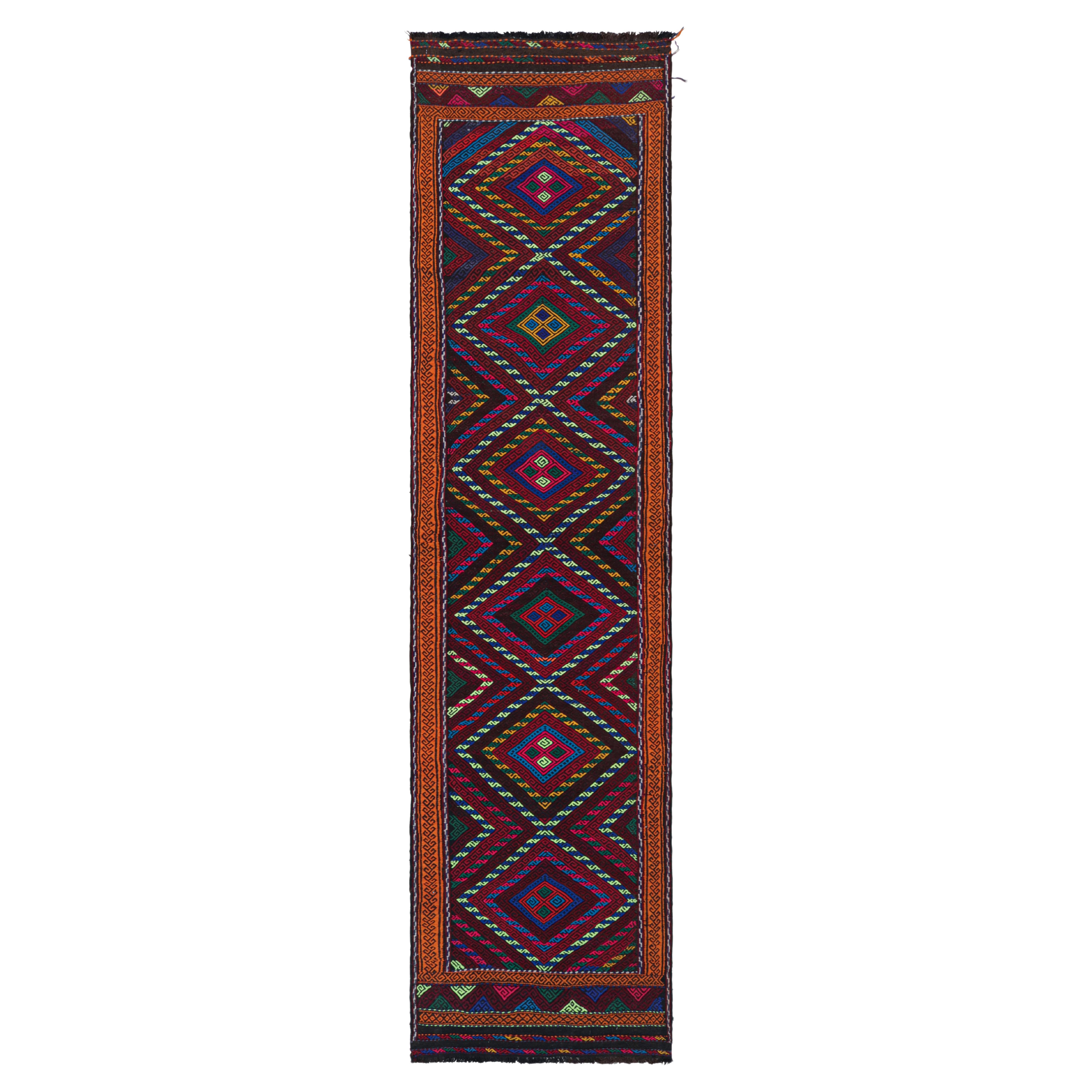 Rug & Kilim’s Contemporary Kilim Runner with Polychromatic Geometric Medallions