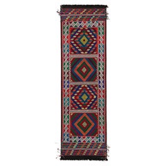 Rug & Kilim’s Contemporary Kilim Runner with Polychromatic Geometric Medallions