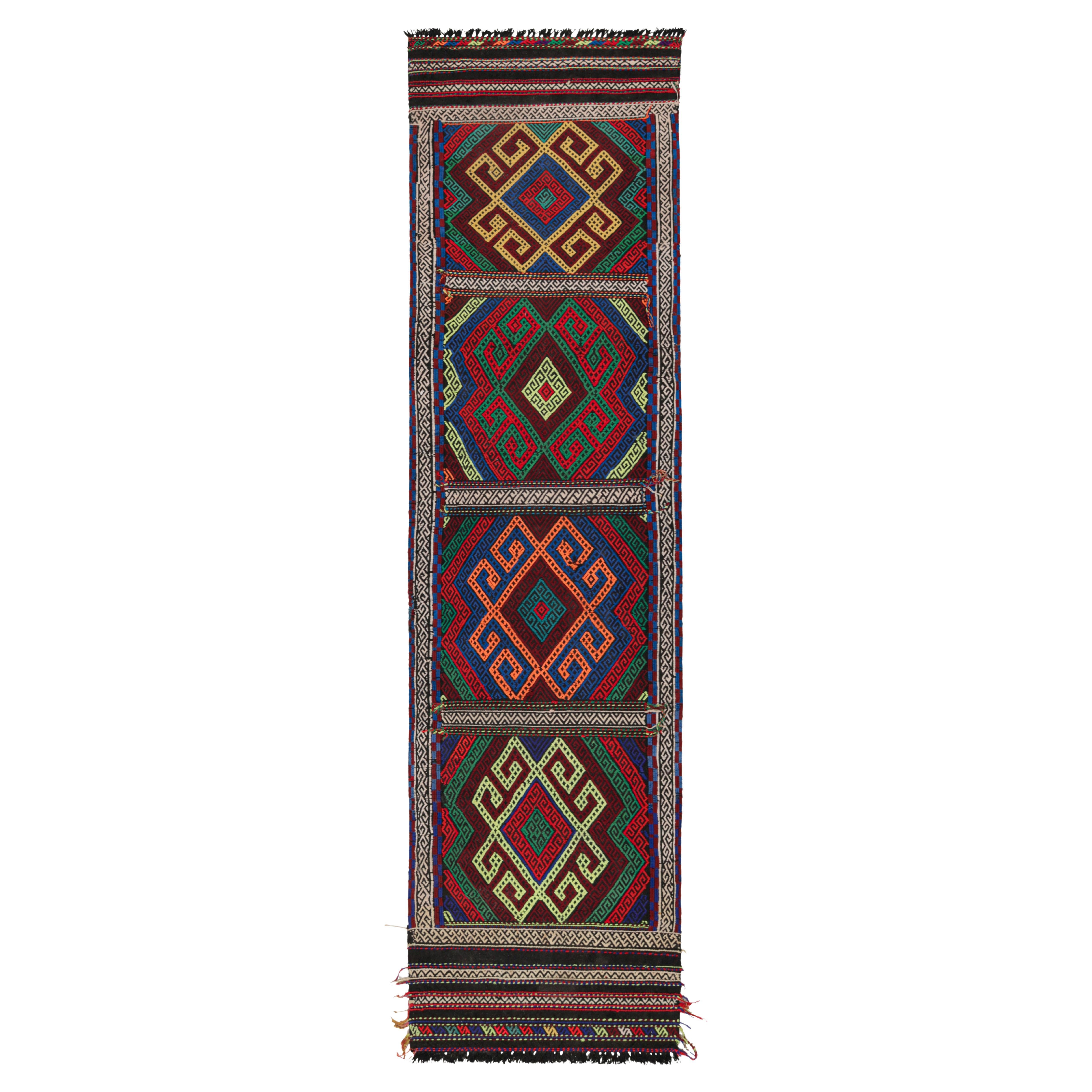 Rug & Kilim’s Contemporary Kilim Runner with Polychromatic Geometric Medallions
