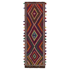 Rug & Kilim’s Contemporary Kilim Runner with Polychromatic Geometric Medallions