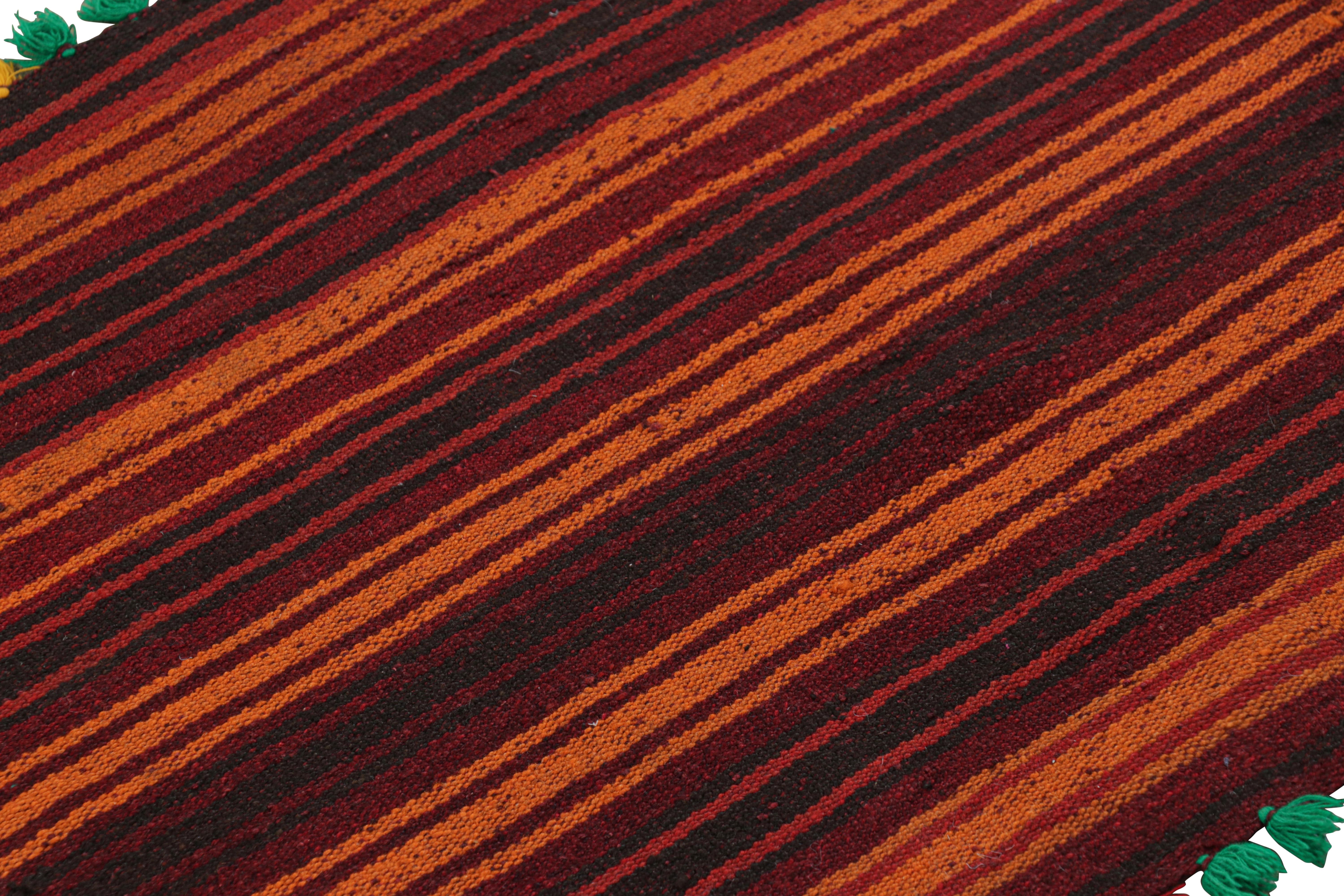 Handwoven in wool, this 2x10 modern geometric kilim runner rug represents a new line of tribal carpets in the Modern Classics Collection by Rug & Kilim. Each piece represents the work of women weavers in Afghanistan, preserving the rich tradition of