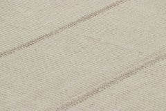 Rug & Kilim’s Contemporary Kilim, Textural White Stripes and Beige Accents