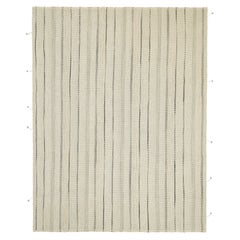 Rug
Kilim è un kilim contemporaneo, bianco con strisce nere e grigie.