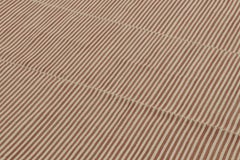 Rug & Kilim’s Contemporary Kilim with Textural Beige and Brown Stripes