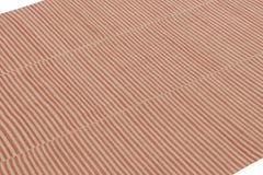 Rug & Kilim’s Contemporary Kilim with Textural Beige and Orange Stripes