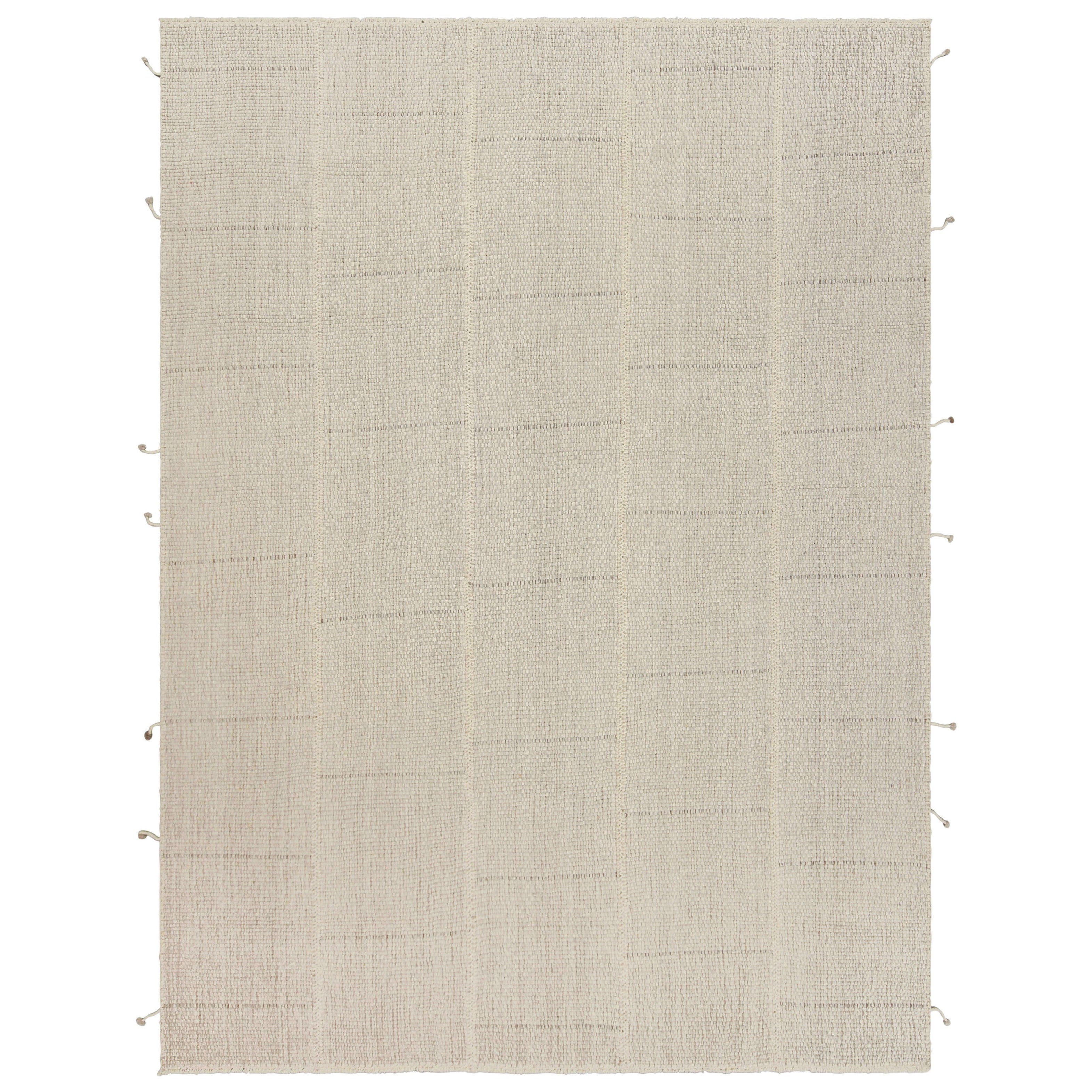 Rug
Kilim è un kilim contemporaneo a strisce beige-marrone e bianche.