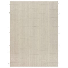 Rug
Kilim è un kilim contemporaneo a strisce beige-marrone e bianche.