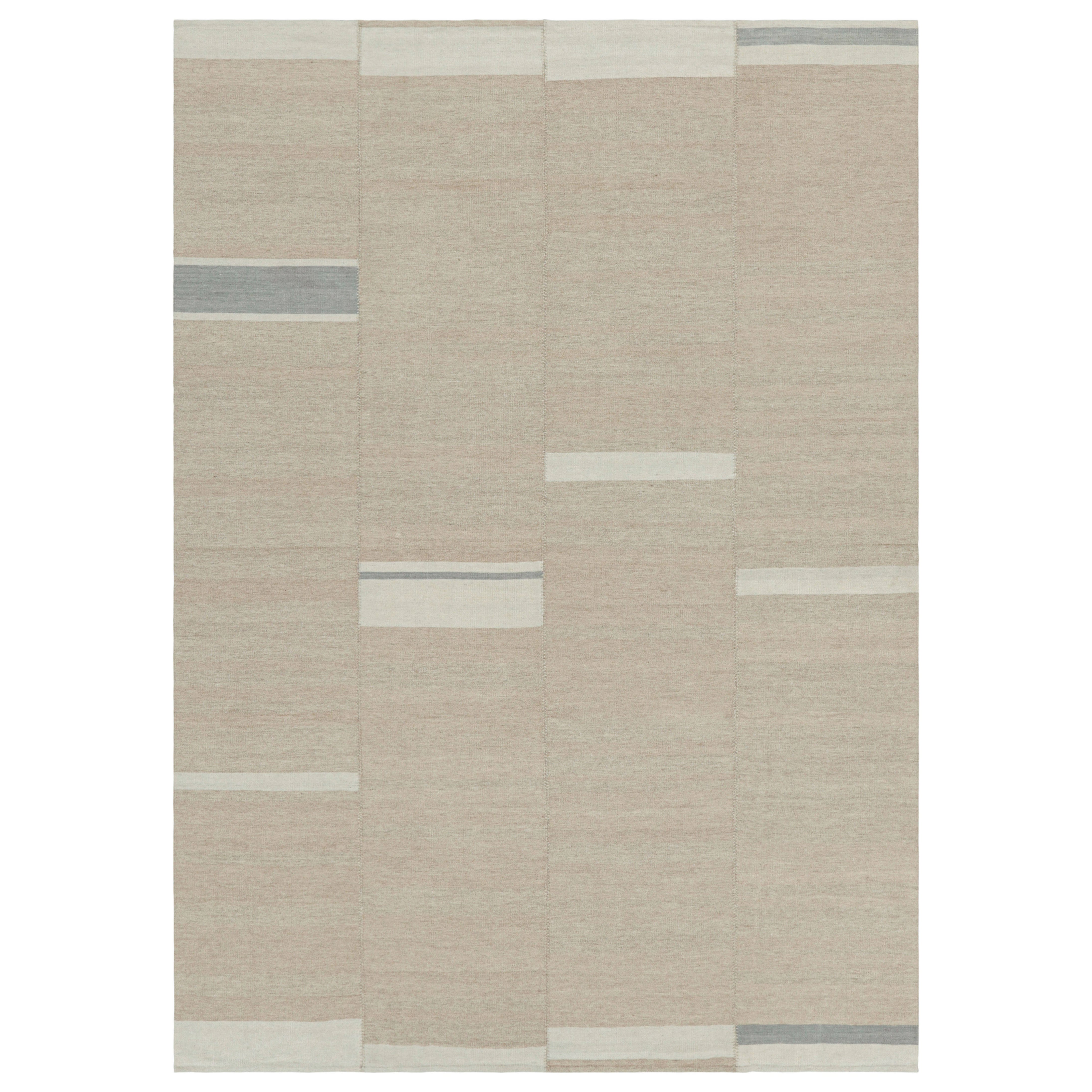 Rug & Kilim è un kilim contemporaneo a strisce beige, taupe e panna.