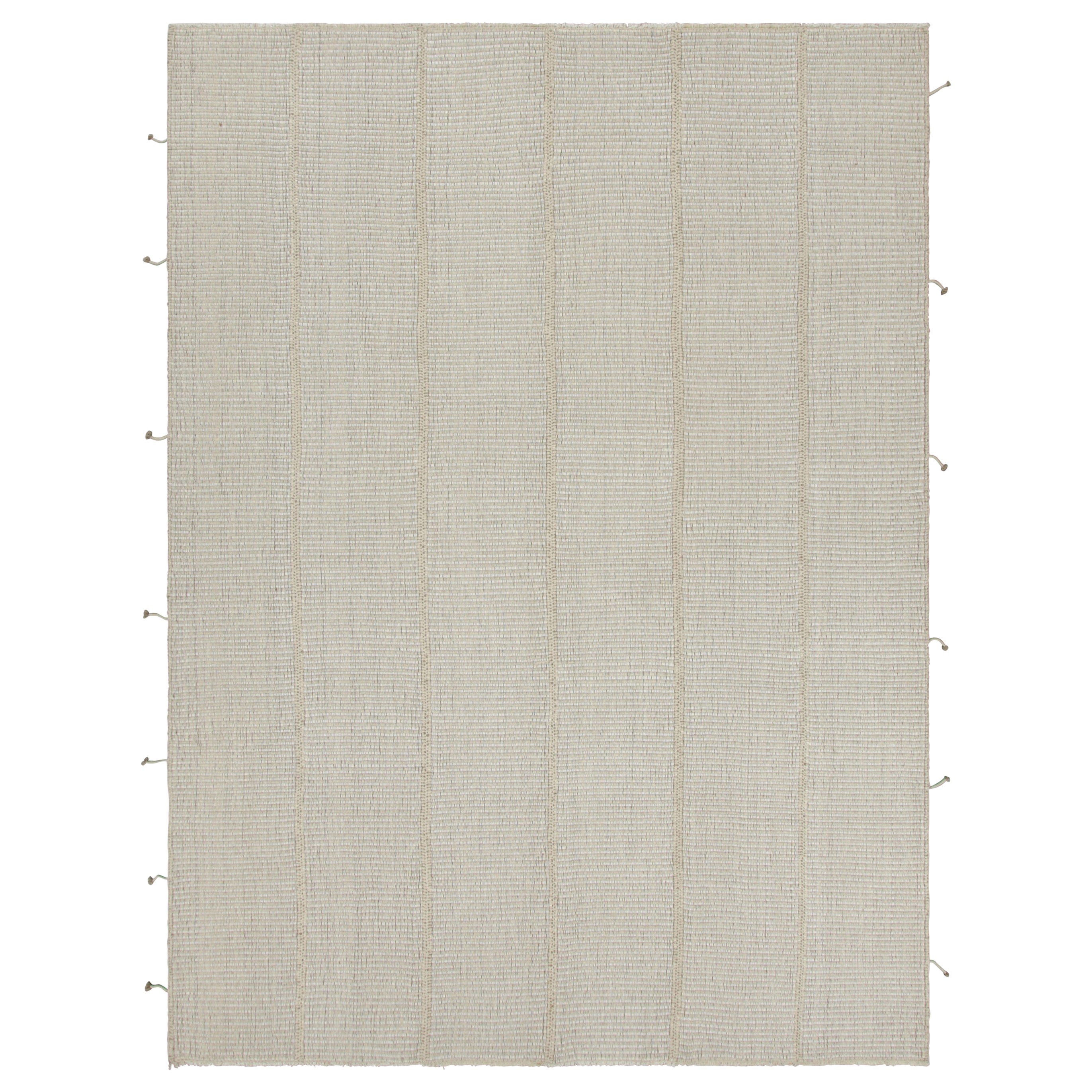 Rug & Kilim è un kilim contemporaneo a strisce beige, taupe e panna.