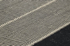 Rug & Kilim’s Contemporary Kilim with Textural Black and Cream White Stripes