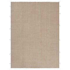 Rug
Kilim è un kilim contemporaneo a strisce color crema, rosa e beige.