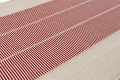 Rug & Kilim’s Contemporary Kilim with Textural Cream, Red, and Beige Stripes
