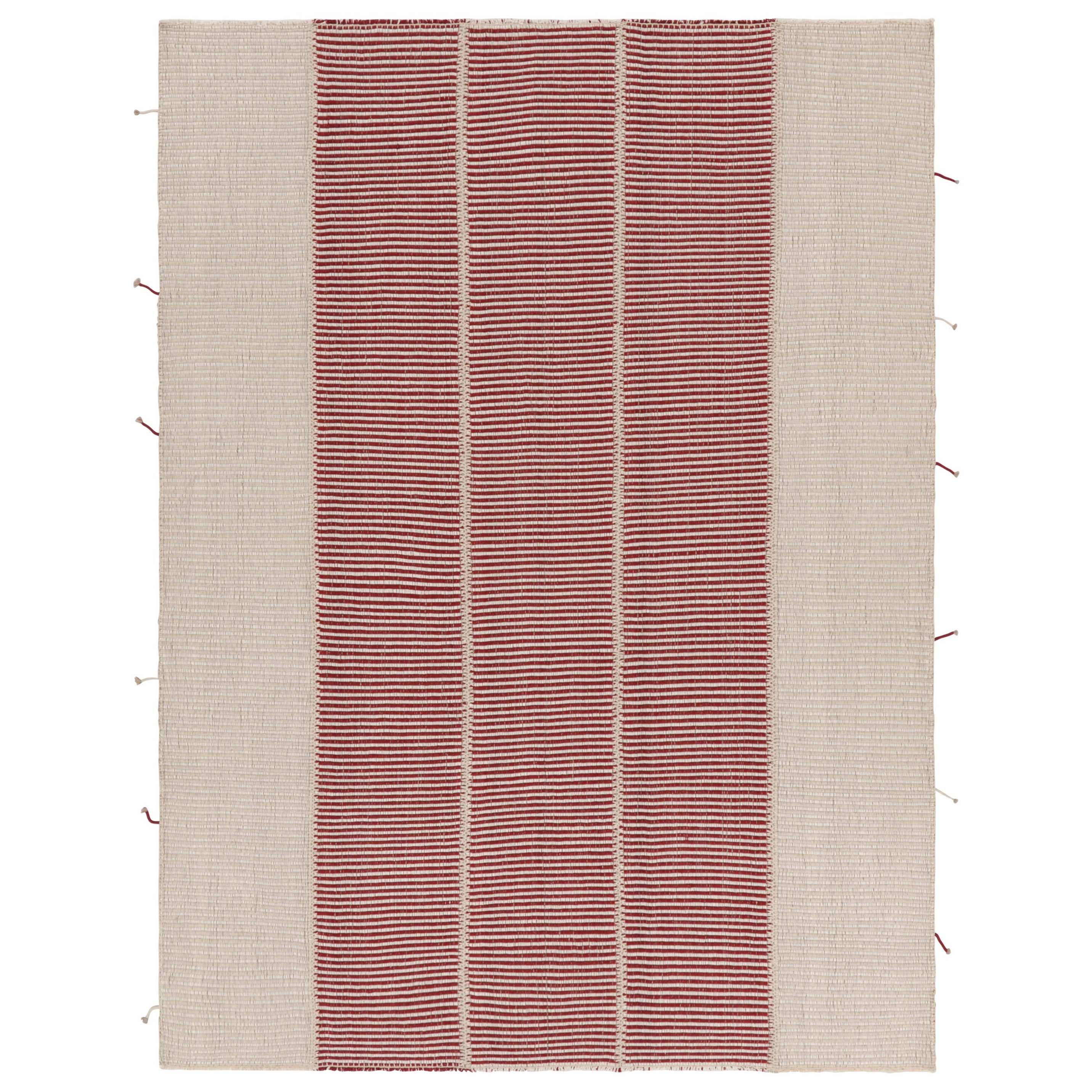 Rug
Kilim
s Zeitgenössischer Kelim mit strukturierten cremefarbenen, roten und beigefarbenen Streifen