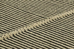Rug & Kilim’s Contemporary Kilim with Textural Cream White and Black Stripes