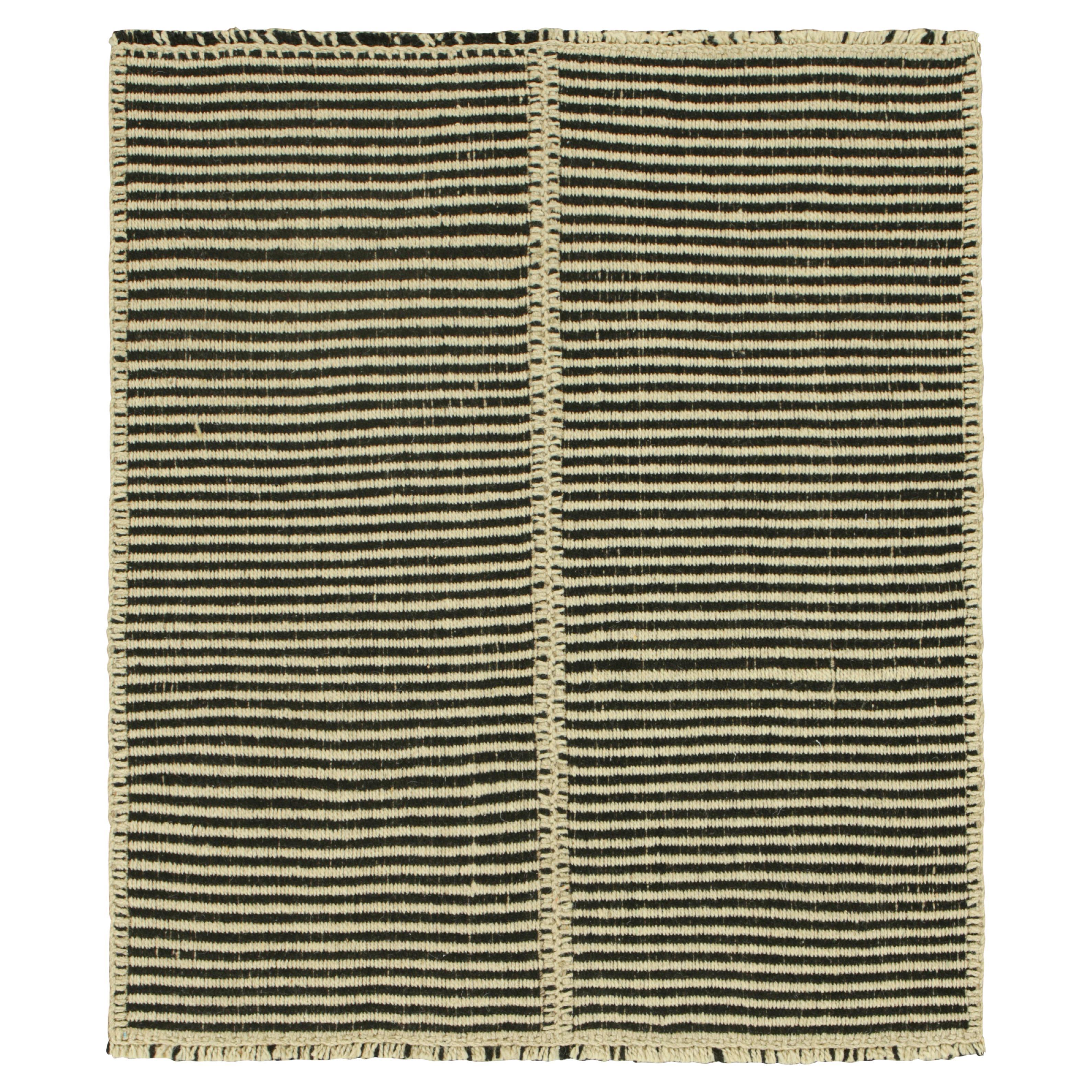 Rug & Kilim’s Contemporary Kilim with Textural Cream White and Black Stripes