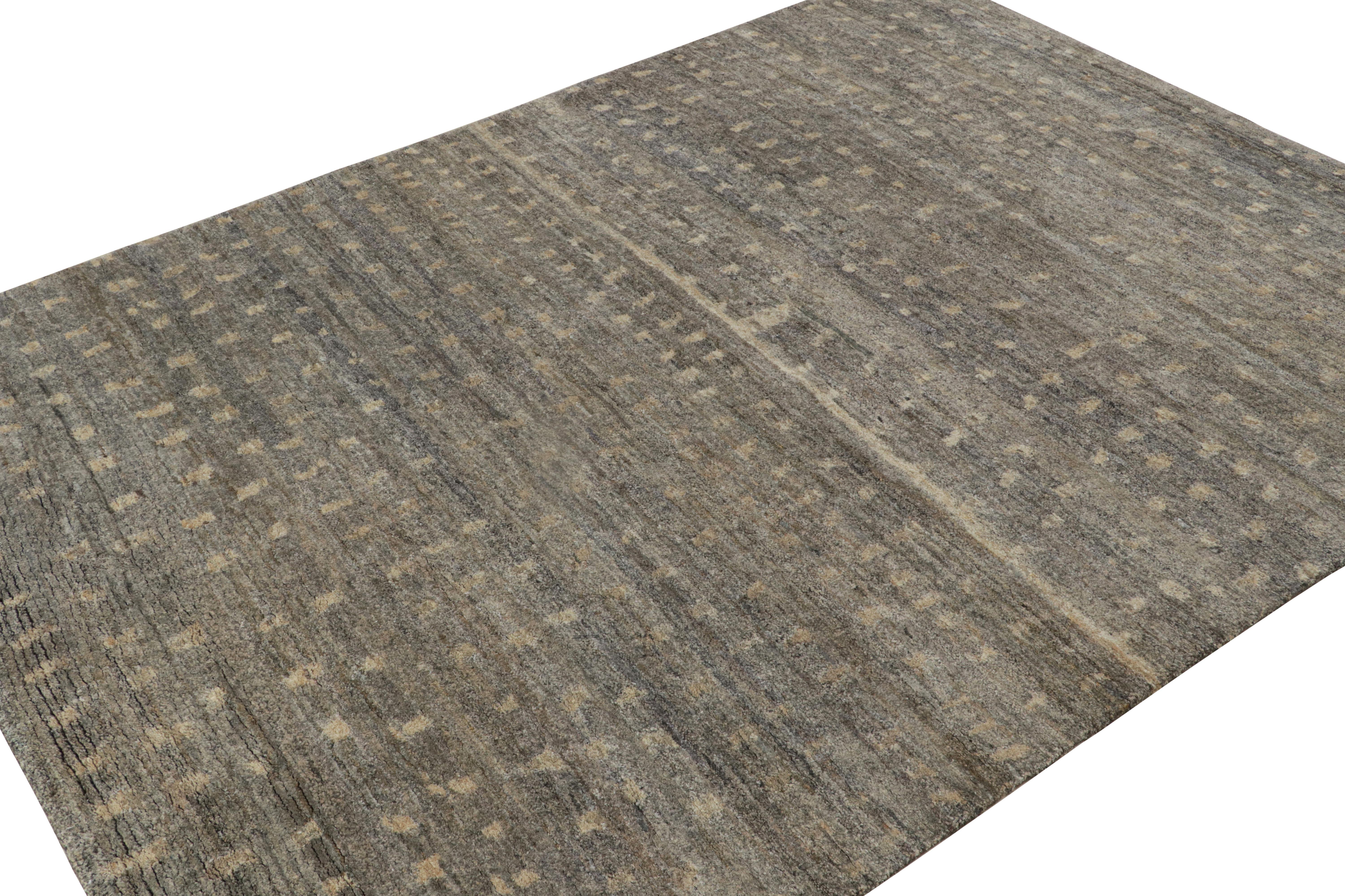 Hand-knotted in silk, this 6x8 contemporary minimalist rug in gray tones underscore dots and striae in beige-brown and light gold hues. 

On the Design: 

An exciting addition to the Rug & Kilim Modern Collection for its brilliant work of art as