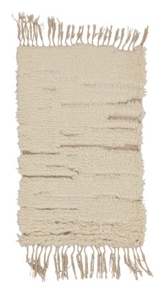 Rug & Kilim’s Contemporary Moroccan-Inspired Shag Rug in Beige and White Tones