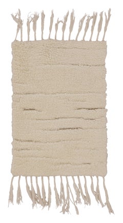 Rug & Kilim’s Contemporary Moroccan-Inspired Shag Rug in Ivory and Beige Tones