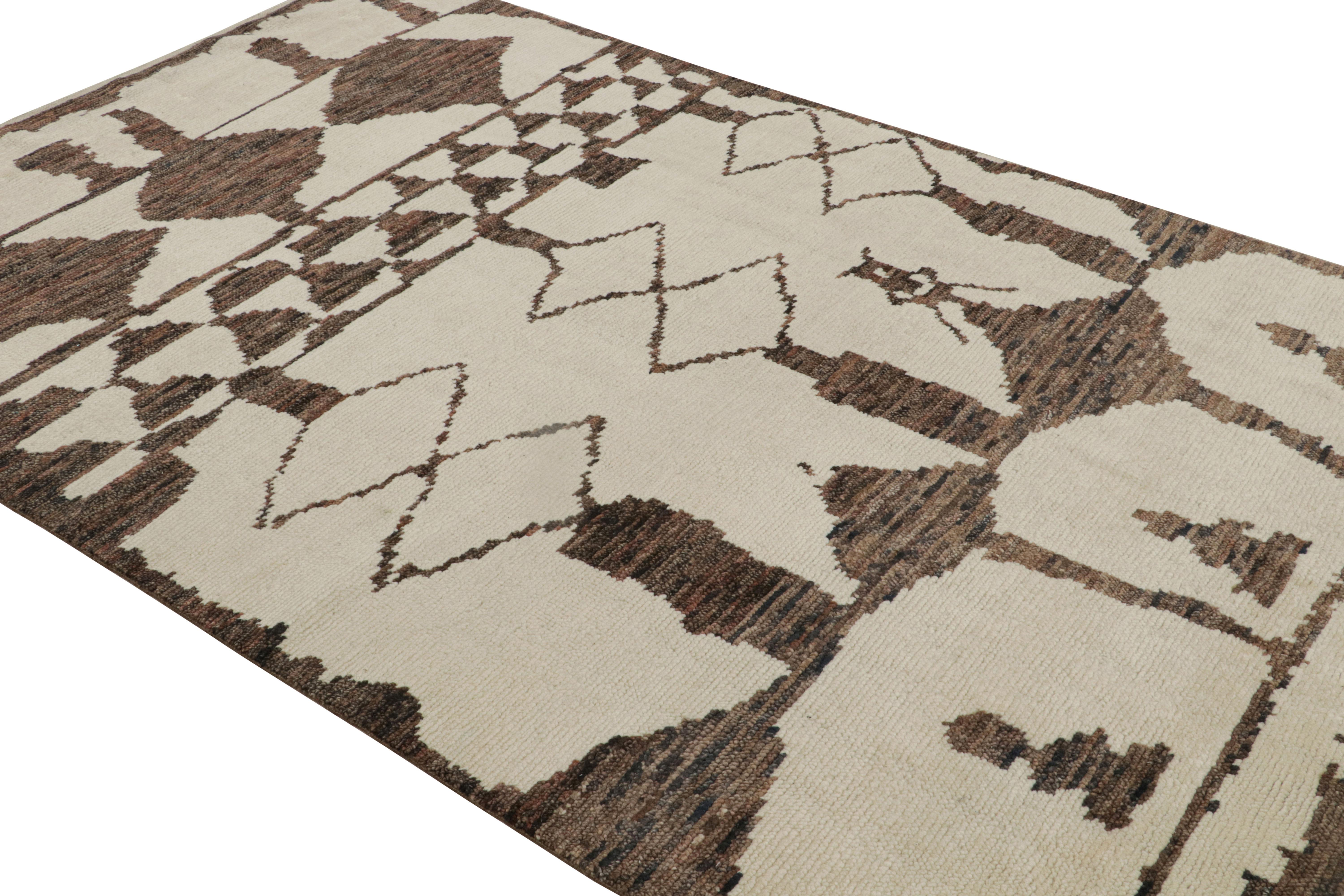 Hand-knotted in wool, this 6x10 contemporary Moroccan style rug in beige and brown, exemplifies Rug & Kilim’s take on contemporary aesthetics. 

On the Design: 

Connoisseurs may admire the subtle appeal of the rug that comes from a Berber geometric