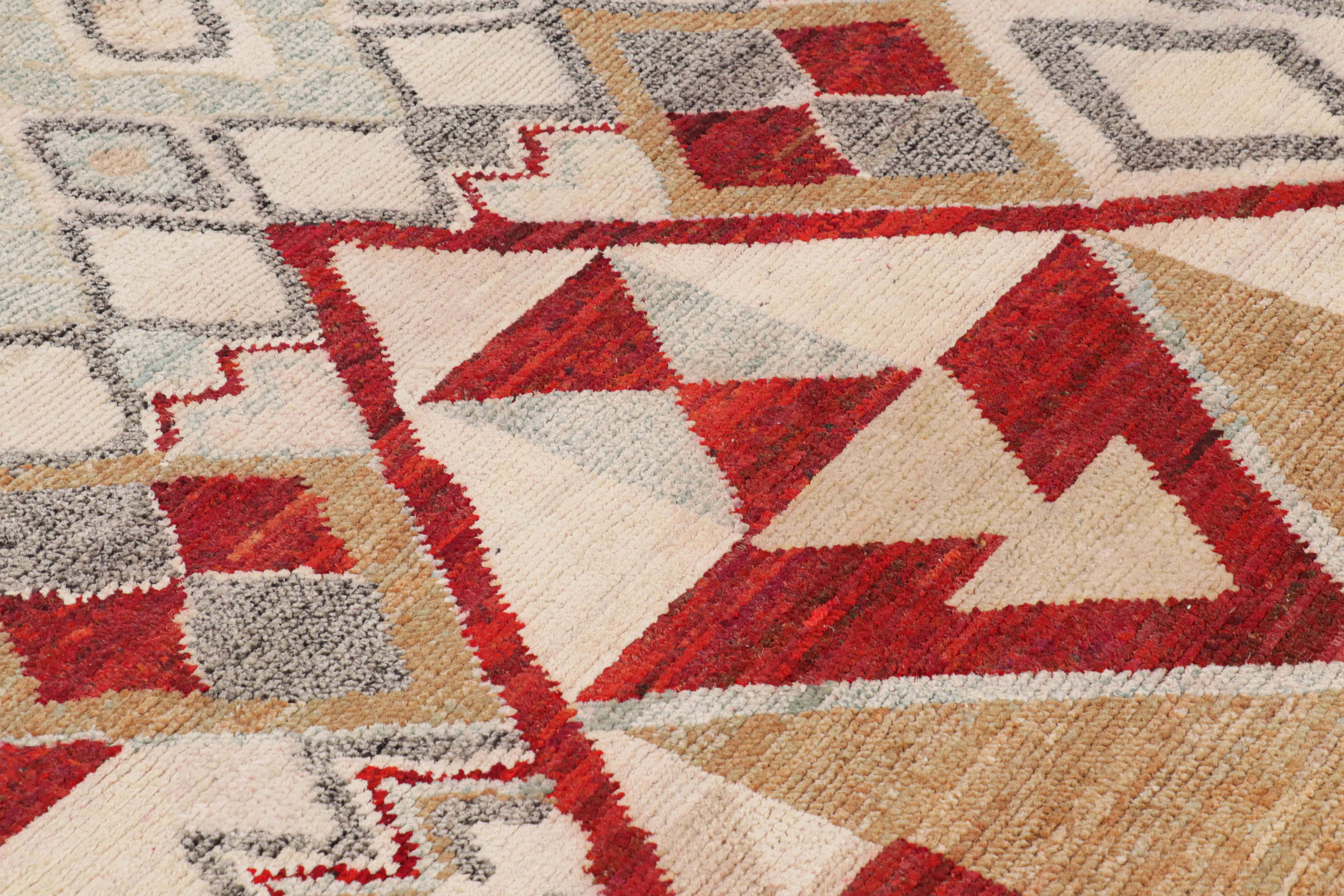 Hand-knotted in silk, this 5x7 contemporary Moroccan style rug features a ribbed texture and geometric patterns inspired by the primitivist Berber weaving traditions. 

On the Design: 

Connoisseurs may admire the subtle appeal of the rug that comes