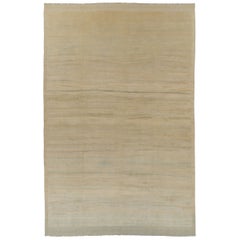 Rug & Kilim’s Contemporary Oversized Rug in Cream and Soft Beige