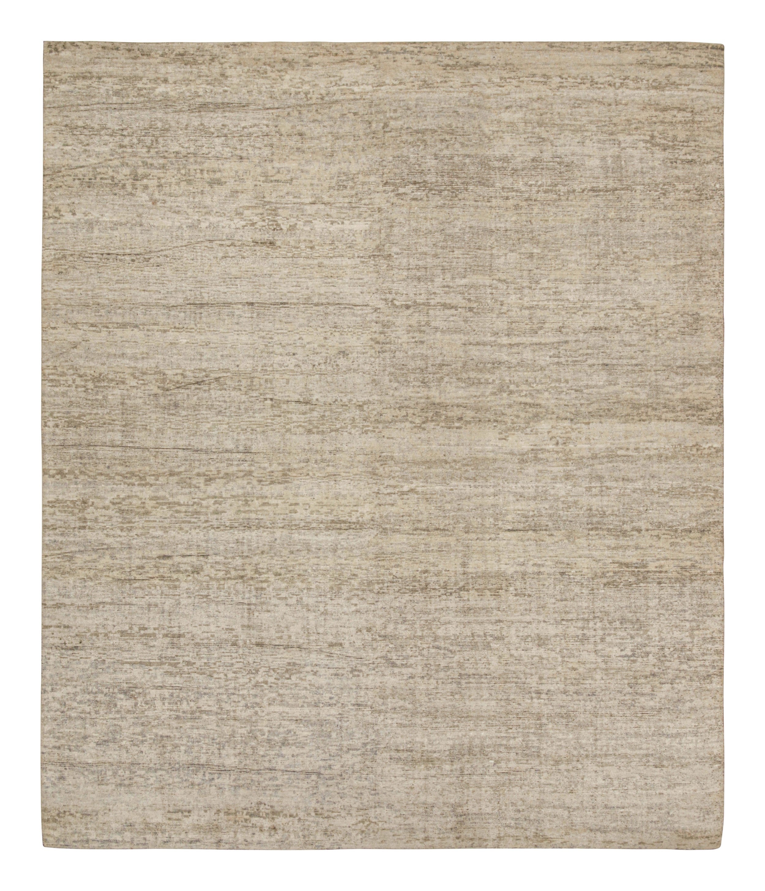 This contemporary 15x18 rug is a new addition to Rug & Kilim’s Texture of Color Collection. Hand-knotted in wool and silk, its design explores a bold take on plain rugs with a minimalist design in neutral tones.

This rug can be cut and resized to