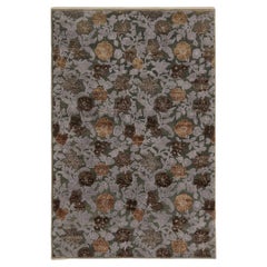 Rug & Kilim’s Contemporary rug in Beige-Brown and Gray-Blue Floral Patterns