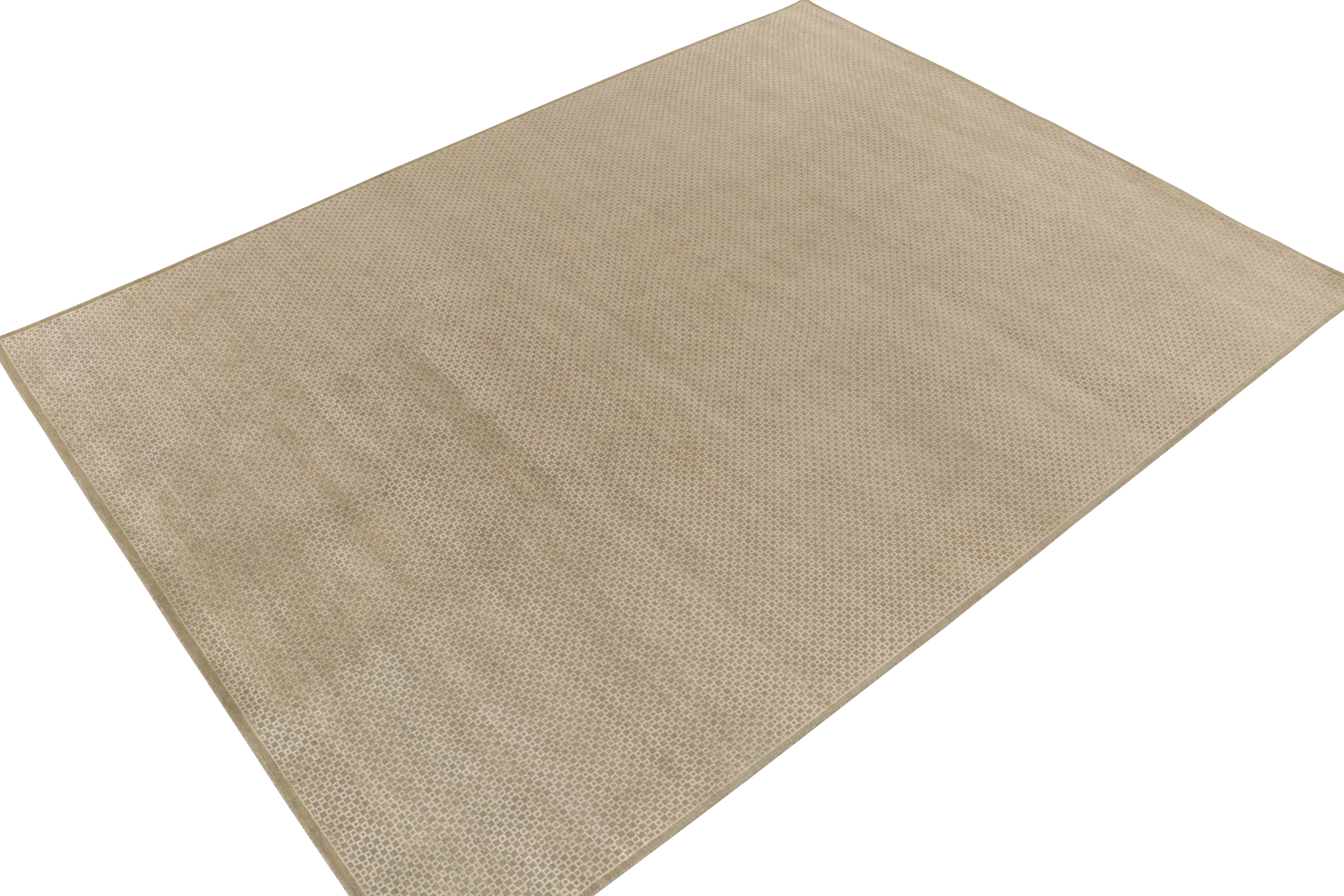 From Rug & Kilim’s contemporary selections, a 9x12 rug hand-knotted in a luxurious blend of wool & silk. 

On the Design: The piece enjoys an unobtrusive, yet intricately made beige-brown and white grid pattern married to a subtle high-low texture.